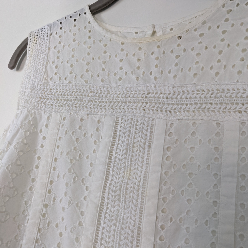 Sleeveless eyelet mini dress with POCKETS